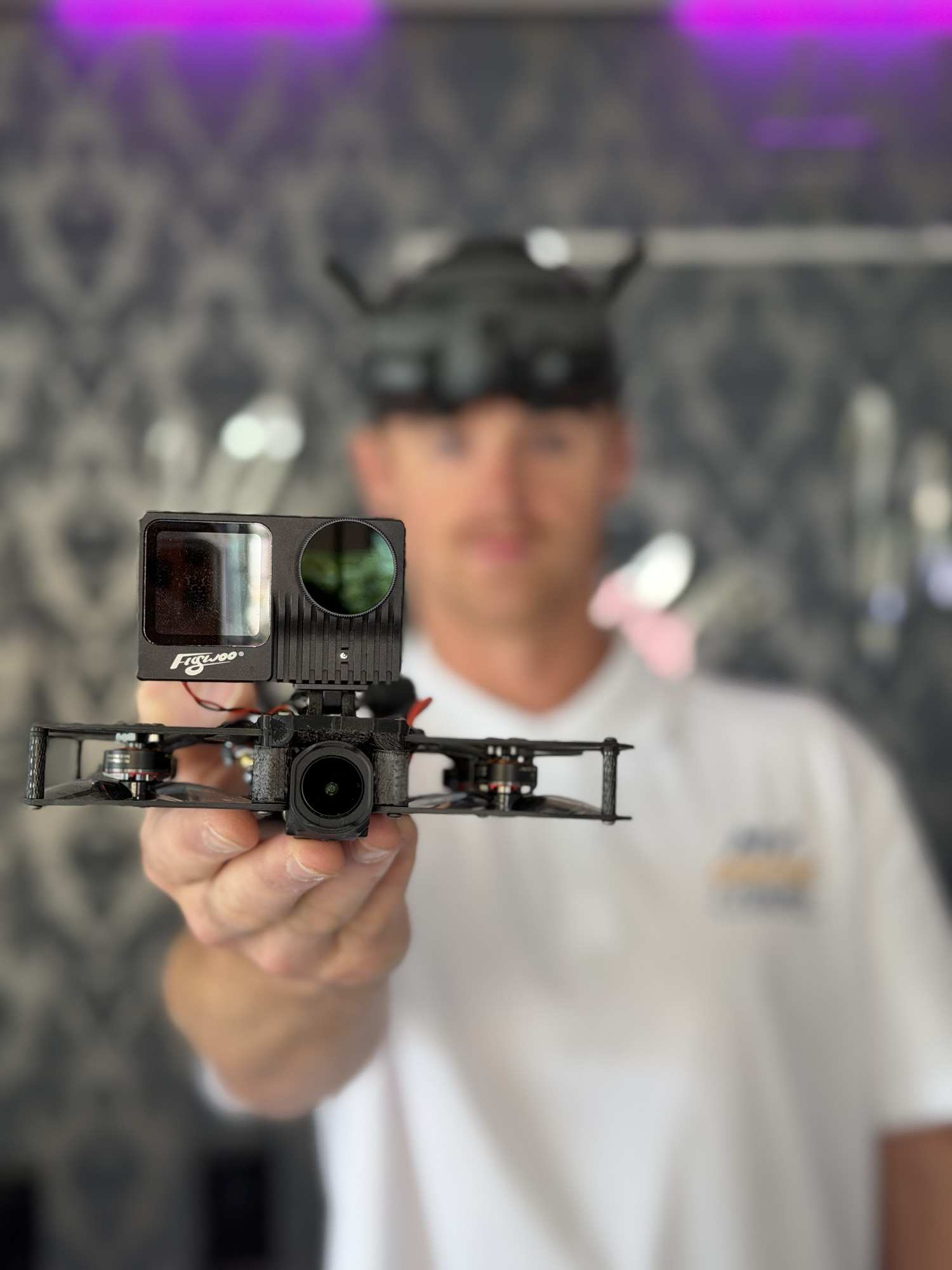 Jeremy, founder of My Drone Tours, holding an FPV drone
